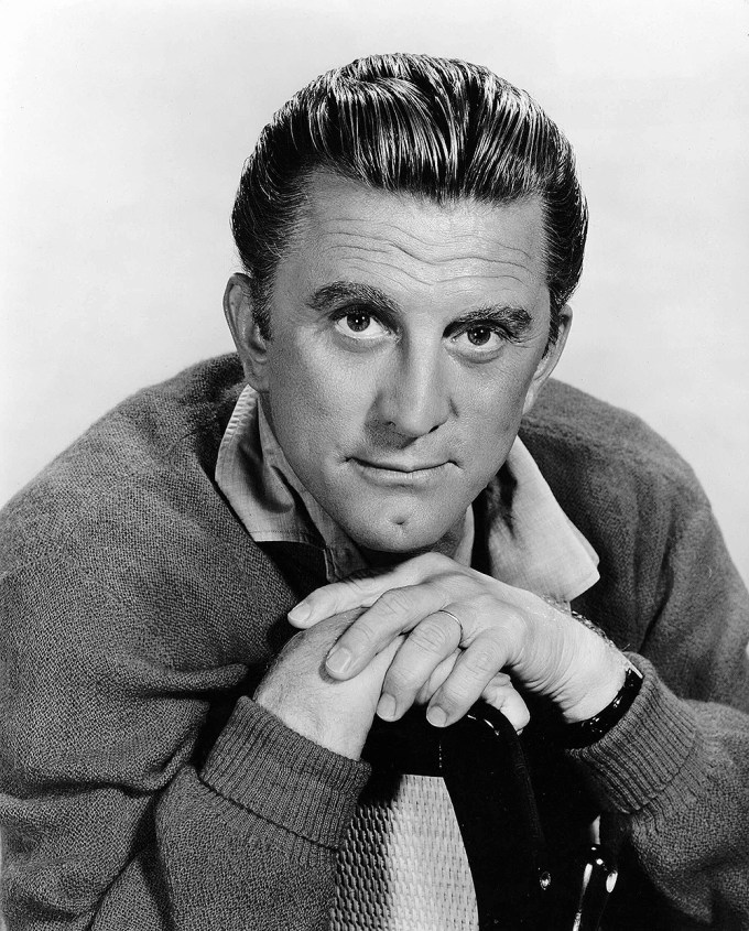 Kirk Douglas poses in 1962