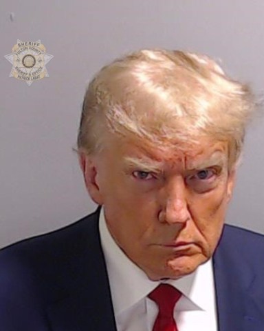 Editorial use only. HANDOUT /NO SALES
Mandatory Credit: Photo by FULTON COUNTY SHERIFF'S OFFICE/HANDOUT/EPA-EFE/Shutterstock (14067527c)
A handout photo made available by the Fulton County Sheriff's Office on 24 August 2023 shows the Fulton County Jail booking photo of former US President Donald Trump in Atlanta, Georgia, USA. Former US President Donald Trump and 18 co-defendants, have been indicted by a Fulton County Grand Jury for 2020 election interference in Georgia.
Former US President Donald Trump and 18 others indicted for 2020 election interference., Atlanta, USA - 24 Aug 2023