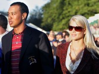 Tiger Woods of the United States and his wife Elin attend the closing ceremony of the 2006 Ryder Cup at  the K Club golf course, Straffan, Ireland, Sunday Sept. 24, 2006.   (AP Photo/Alastair Grant)  **  EDITORIAL USE ONLY  **