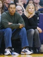©2003 RAMEY PHOTO 310-828-3445Tiger Woods and his girlfriend Elin Nordegren of Sweden sit courtside during the NBA game between the Los Angeles Lakers and the Houston Rockets February 18, 2003 at Staples Center in Los Angeles. Woods, who recently won the Buick Invitational in San Diego, will compete in the Nissan Open in Los Angeles this weekend.JR21803 (Mega Agency TagID: MEGAR109578_2[3].jpg) [Photo via Mega Agency]