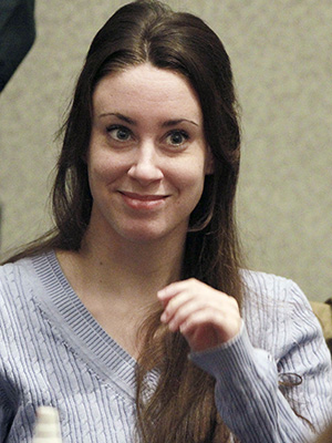FILE - In this July 7, 2011 file photo, Casey Anthony smiles before the start of her sentencing hearing in Orlando, Fla.  On Tuesday, Oct. 25, 2011, the names of the jurors in the Casey Anthony trial were made public for the first time since they acquitted the Florida mother on charges of murdering her 2-year-old daughter, Caylee.    (AP Photo/Joe Burbank, File)