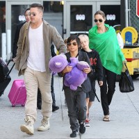 Brad Pitt, Angelina Jolie, Shiloh Jolie-Pitt, Pax Jolie-Pitt
Brad Pitt and Angelina Jolie at LAX airport, Los Angeles, America - 05 Feb 2014