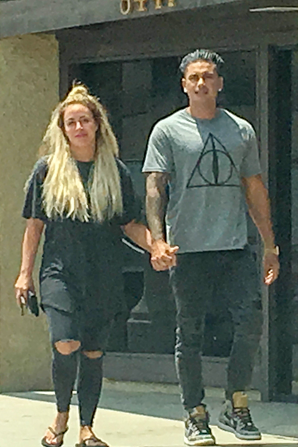 *EXCLUSIVE* Pauly D spotted with a mystery woman in West Hollywood amidst abuse allegations