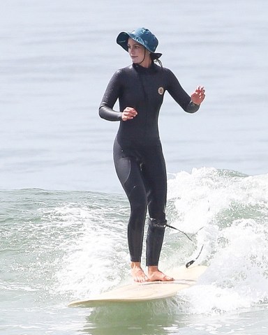 Malibu, CA  - *EXCLUSIVE*  - Leighton Meester and Adam Brody enjoying a morning surf session in Malibu.

Pictured: Leighton Meester

BACKGRID USA 4 JUNE 2022 

USA: +1 310 798 9111 / usasales@backgrid.com

UK: +44 208 344 2007 / uksales@backgrid.com

*UK Clients - Pictures Containing Children
Please Pixelate Face Prior To Publication*