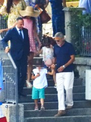 CERNOBBIO, ITALY - *EXCLUSIVE* - Actor George Clooney and his wife Amal enjoy their family holidays in the province of Como.The 61-year-old The Ocean's Eleven actor looked casual in his blue top during a boat ride with Amal who was stunned in her summer dress and hat, taking in the sights of their picturesque surroundings during the family trip.Pictured: George Clooney - Amal Clooney BACKGRID USA 13 JULY 2022 BYLINE MUST READ: COBRA TEAM / BACKGRIDUSA: +1 310 798 9111 / usasales@backgrid.comUK: +44 208 344 2007 / uksales@backgrid.com*UK Clients - Pictures Containing ChildrenPlease Pixelate Face Prior To Publication*