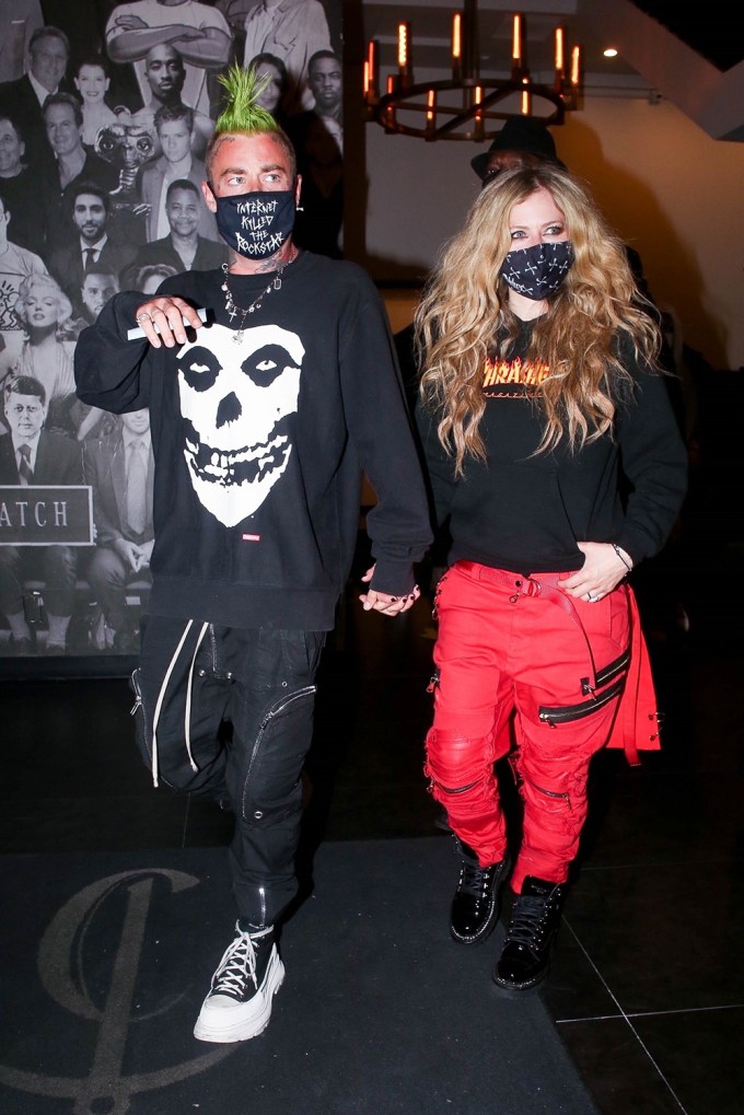 Avril Lavigne & Mod Sun Hold Hands