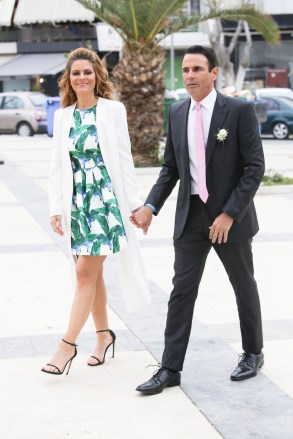 EXCLUSIVE: MARIA MENOUNOS WAS MAID OF HONOR AT A WEDDING IN HERAKLION, CRETE. MARIA MENOUNOS WITH HER HUSBAND KEVIN UNDERGARO WENT TO CRETE FOR THE WEDDING OF THEIR FRIEND AND BESTMAN IN THEIR WEDDING SOTIRIS KYRANAKOS. THE WEDDING TOOK PLACE AT AGIOS NIKOLAOS CHURCH, IN ALIKARNASSOS, A VILLAGE NEAR HERAKLION, CRETE. 04 May 2019 Pictured: MARIA MENOUNOS KEVIN UNDERGARO. Photo credit: MEGA TheMegaAgency.com +1 888 505 6342 (Mega Agency TagID: MEGA412580_002.jpg) [Photo via Mega Agency]