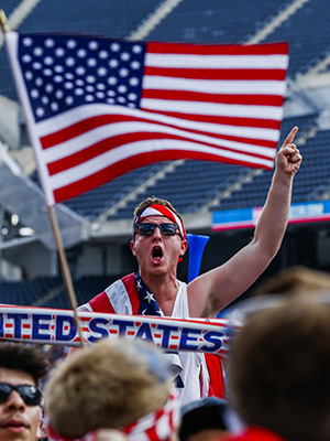 A Us Fan Cheers During the Fifa World Cup 2014 Round of 16 Match Between the Usa and Belgium Played at the Arena Fonte Nova in Salvador Brazil at Soldier Field in Chicago Illinois Usa 01 July 2014 Belgium Won the Match 2-1 After Extra Time United States ChicagoUsa Soccer Fifa World Cup 2014 - Jul 2014