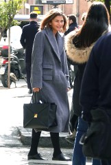 Rome, ITALY  - *EXCLUSIVE*  - Bulgari's global ambassador Zendaya is spotted leaving the Eden Hotel in Rome after three days of filming the new Bulgari advertisement. Zendaya used the back service door where she stopped to take a few selfies with her lucky fans. The actress went makeup free and sported a long coat and Valentino one stud Nappa handbag.

Pictured: Zendaya

BACKGRID USA 13 FEBRUARY 2023 

BYLINE MUST READ: Cobra Team / BACKGRID

USA: +1 310 798 9111 / usasales@backgrid.com

UK: +44 208 344 2007 / uksales@backgrid.com

*UK Clients - Pictures Containing Children
Please Pixelate Face Prior To Publication*