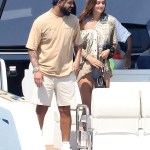 Saint-Tropez, FRANCE  - *EXCLUSIVE*  - Rapper Drake and a mystery woman arrive for lunch at Club 55 in Saint-Tropez while vacationing in the French Riviera.

Pictured: Drake

BACKGRID USA 19 JULY 2022 

BYLINE MUST READ: ELIOT / MEGA - BEST IMAGE / BACKGRID

USA: +1 310 798 9111 / usasales@backgrid.com

UK: +44 208 344 2007 / uksales@backgrid.com

*UK Clients - Pictures Containing Children
Please Pixelate Face Prior To Publication*
