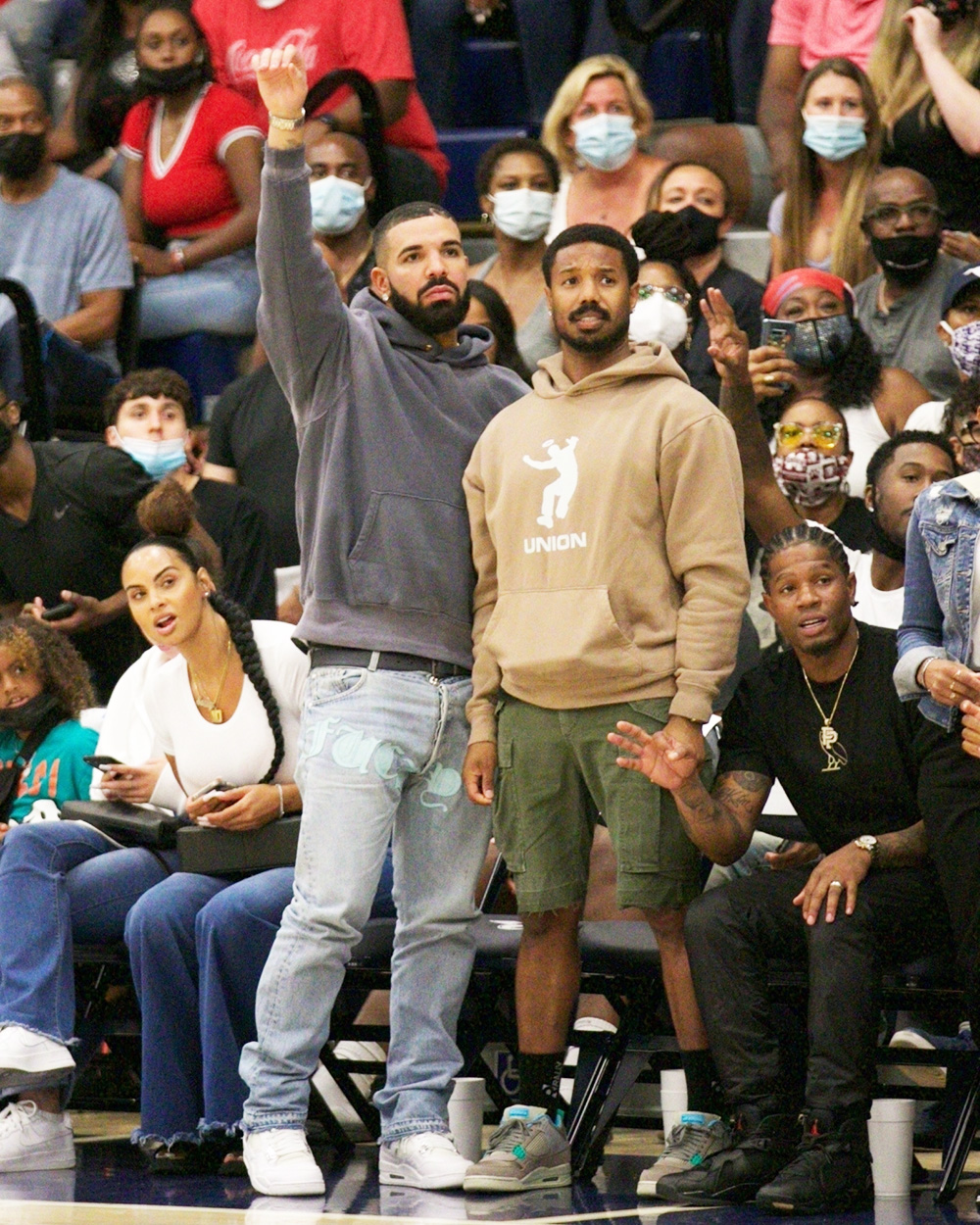 Chatsworth, CA  - Drake & Michael B Jordan step out to support Bronny James, Amari Bailey & the Sierra Canyon Varsity Basketball squad play their last basketball game of the season. Drake shows a lot of emotion during the game; smiling, yelling frantically at the refs and cheering his boys as they fall short to be eliminated from the regional playoffs. Interestingly enough Drake made his feeling known in the form of fashion as he donned jeans with 'Fuck You' printed near his crotch. At the end of the game, he shows love to Amari Bailey who had a stellar season.

Pictured: Drake, Michael B. Jordan, Bronny James, Amari Bailey, Savannah James

BACKGRID USA 17 JUNE 2021 

BYLINE MUST READ: ShotbyNYP / BACKGRID

USA: +1 310 798 9111 / usasales@backgrid.com

UK: +44 208 344 2007 / uksales@backgrid.com

*UK Clients - Pictures Containing Children
Please Pixelate Face Prior To Publication*