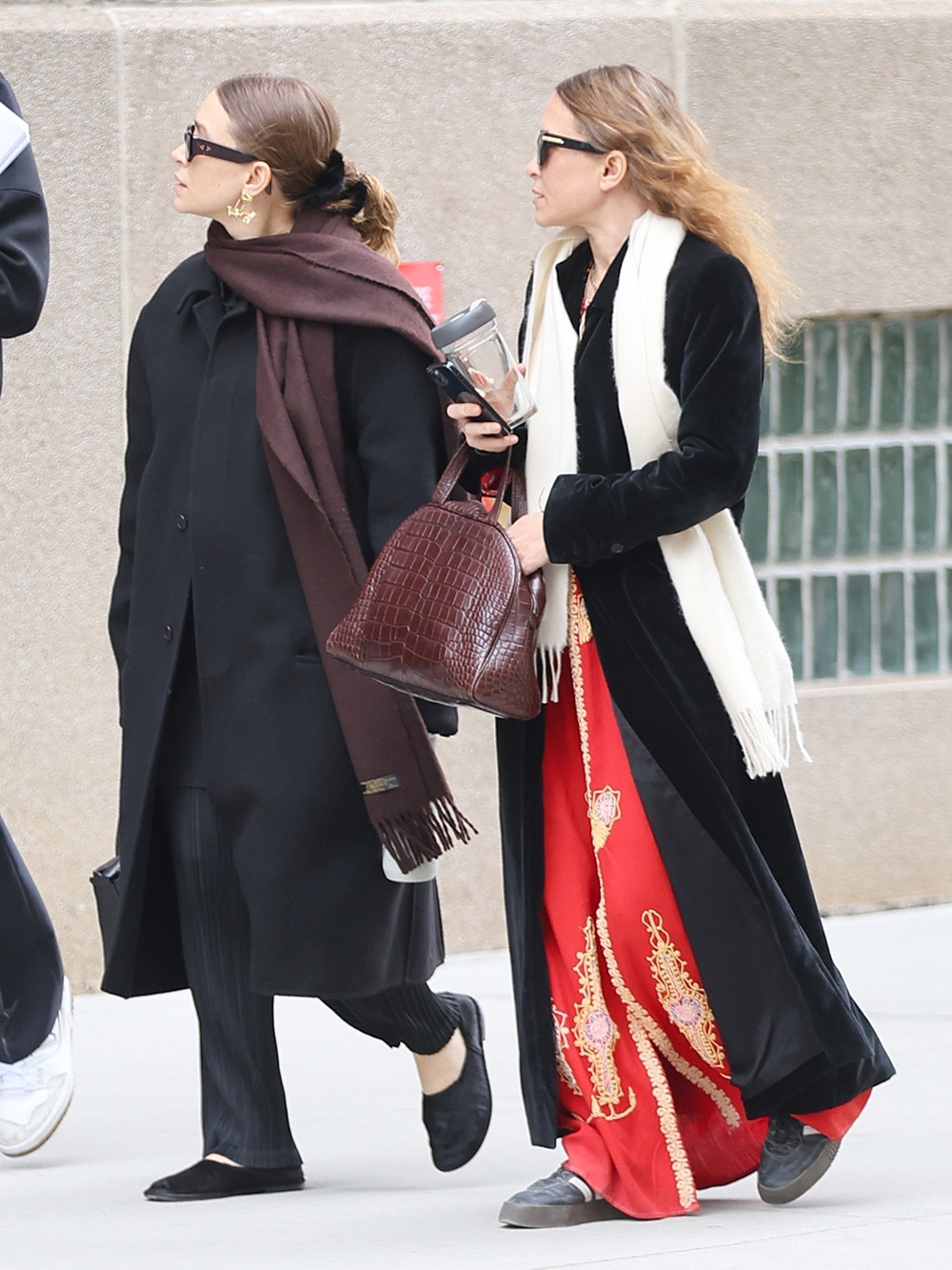 *EXCLUSIVE* New York City, NY - Fashion designers and actresses Mary-Kate and Ashley Olsen are spotted on a coffee run with their bodyguard in New York City. Shot on 02/16/23. Pictured: Mary-Kate Olsen, Ashley Olsen BACKGRID USA 17 FEBRUARY 2023 BYLINE MUST READ: T.JACKSON / BACKGRID USA: +1 310 798 9111 / usasales@backgrid.com UK: +44 208 344 2007 / uksales@backgrid.com *UK Clients - Pictures Containing Children Please Pixelate Face Prior To Publication*