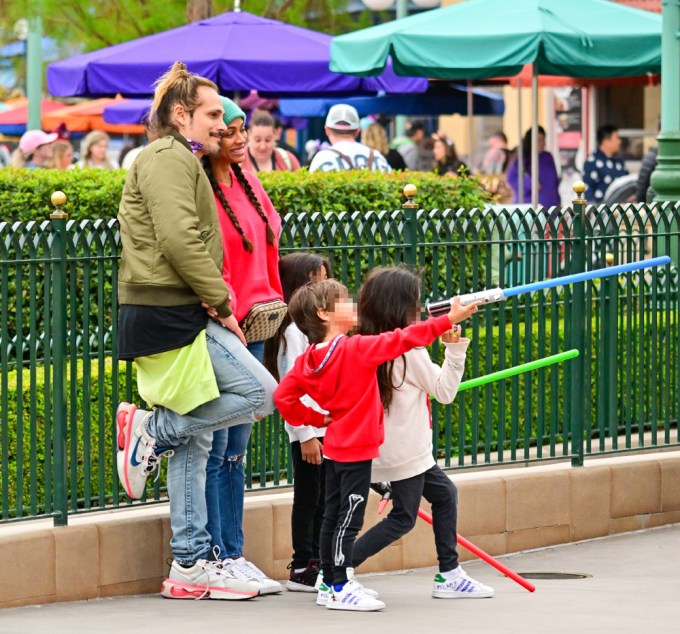 Zoe Saldana and her husband Marco Perego Saldana at Disneyland