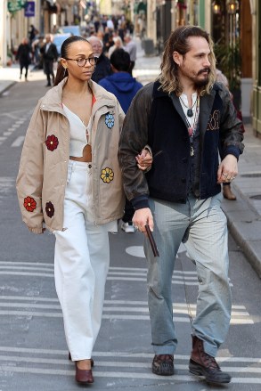 Paris, FRANCE  - *EXCLUSIVE*  - Zoe Saldana and her man, Marco Perego, were caught getting cozy during their recent visit to LLe Saint Louis in Paris. The loved-up duo decided to leave their kids with their grandparents and take a romantic walk around the island, holding hands and smooching along the way.

Pictured: Zoe Saldana, Marco Perego

BACKGRID USA 9 APRIL 2023 

USA: +1 310 798 9111 / usasales@backgrid.com

UK: +44 208 344 2007 / uksales@backgrid.com

*UK Clients - Pictures Containing Children
Please Pixelate Face Prior To Publication*