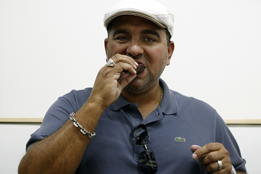 Buddy Valastro
US celebrity chef Buddy Valastro in Colombia, Medellin - 26 Aug 2017
US celebrity chef Buddy Valastro (L), from the television program 'Cake Boss', eats a chocolate in Medellin, Colombia, 26 August 2017. Valastro, who is in Medellin as s guest of the 'Sweet Fair', said he plans to open 'Carlo's Bake Shop' branches in Colombia in about two years.