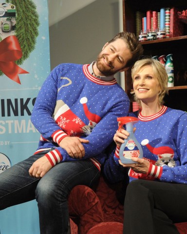 Here is Jane Lynch, 55, cozying up with a pug dog and her Glee costar Matthew Morrison, 37. The actors were both involved with '12 Stinks of Christmas' campaign from air freshener brand Febreze. "When the turkey's burning and your bathroom is seeing a lot of foot traffic from party guests, it hits you: the holidays stink," said the The 40-Year-Old Virgin star. Morrison, who also performs on Broadway, has also collaborated with his former TV co-star for a jolly holiday duet: "We always have such an amazing time together," he said. 


Pictured: Jane Lynch gets festive with Matthew Morrison and Doug the Pug dog.,Jane Lynch gets festive with Matthew Morrison
Doug the Pug dog.
Ref: SPL1193030 101215 NON-EXCLUSIVE
Picture by: SplashNews.com

Splash News and Pictures
Los Angeles: 310-821-2666
New York: 212-619-2666
London: +44 (0)20 7644 7656
Berlin: +49 175 3764 166
photodesk@splashnews.com

World Rights