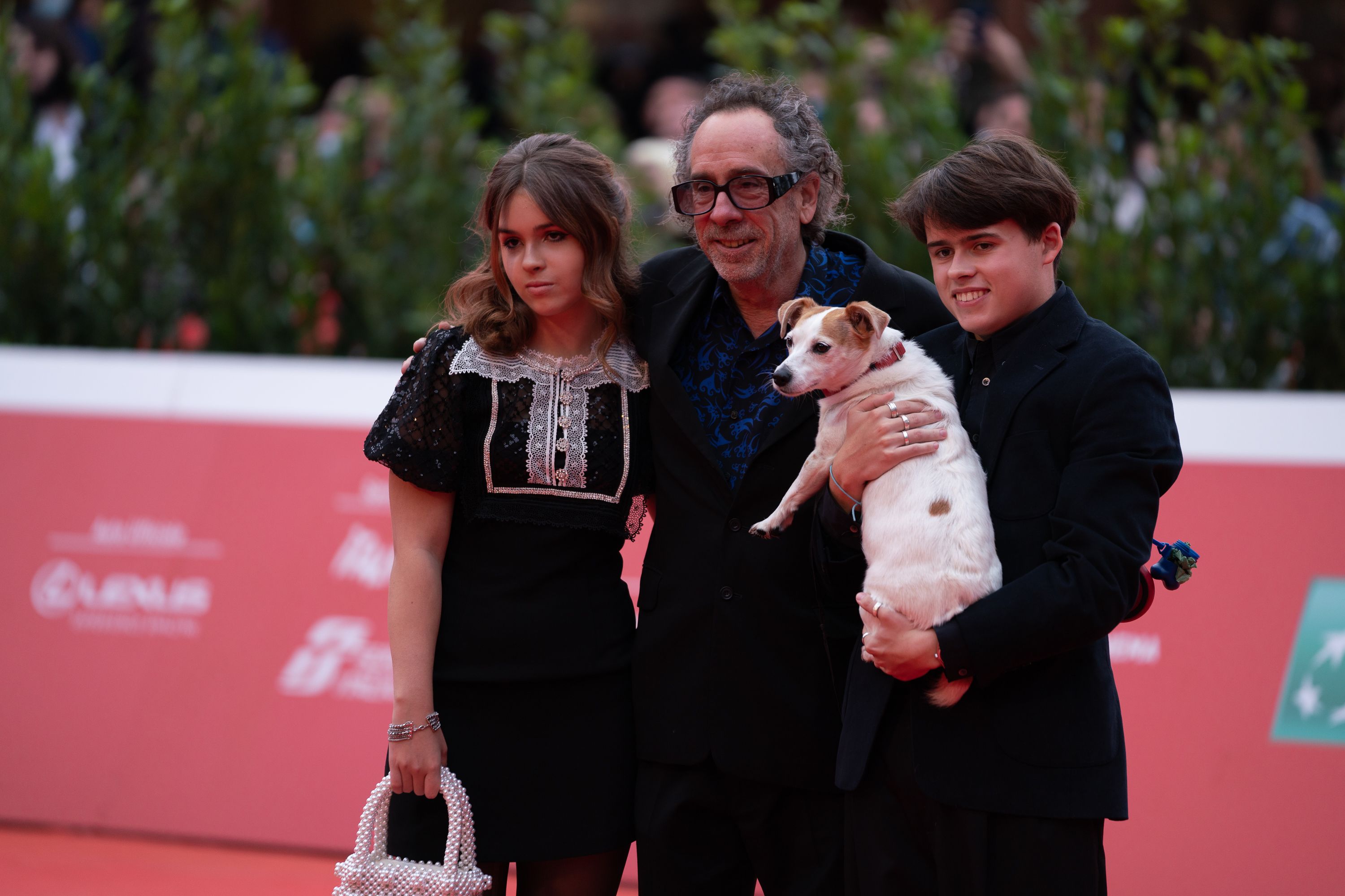 (L-R) Nell Burton, Tim Burton, Billy-Ray Burton and Levi the dog attend the Tim Burton Close Encounter red carpet during the 16th Rome Film Fest 2021 on October 23, 2021 in Rome, Italy.Tim Burton Close Encounter - 16th Rome Film Fest 2021, Italy - 23 Oct 2021