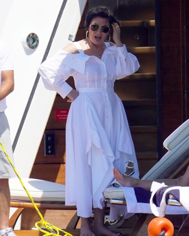 EXCLUSIVE: Kris Jenner and Corey Gamble are seen on a yacht and jet skiing in St Tropez. 15 Jul 2022 Pictured: Kris Jenner and Corey Gamble on a yacht in St Tropez. Photo credit: EliotPress / MEGA TheMegaAgency.com +1 888 505 6342 (Mega Agency TagID: MEGA878370_008.jpg) [Photo via Mega Agency]