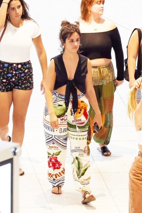 Miami Beach, FL  - *EXCLUSIVE*  - Camila Cabello, who just turned 26 a week ago, is seen surrounded by her best friends walking, shopping and having lunch at Aventura Mall. The singer keeps it casual in white FARM Rio printed pants and a black top for the outing.

Pictured:  Camila Cabello

BACKGRID USA 8 MARCH 2023 

USA: +1 310 798 9111 / usasales@backgrid.com

UK: +44 208 344 2007 / uksales@backgrid.com

*UK Clients - Pictures Containing Children
Please Pixelate Face Prior To Publication*