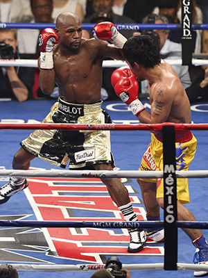Editorial use only. No merchandising.Mandatory Credit: Photo by BPI/Shutterstock (4743573ac)Floyd Mayweather Jr v Manny PacquiaoBoxing - WBC/WBA/WBO Welterweight Title Fight Floyd Mayweather v Manny Pacquiao MGM Grand, Las Vegas, United States - 2 May 2015