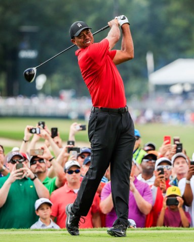 Tiger Woods of the US hits his tee shot on the fourth hole during the fourth round of the Tour Championship golf tournament and the FedEx Cup final at Eastlake Golf Club in Atlanta, Georgia, USA, 23 September 2018. Tournament play runs from 20 September to 23 September.
Tour Championship golf tournament & FedEx Cup final, Atlanta, USA - 23 Sep 2018