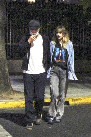 Argentina, ARGENTINA  - *EXCLUSIVE*  - Robert Pattinson went to dinner incognito with his girlfriend Suki Waterhouse and their local friend and hostess. The actor had arrived in the city 3 days ago to wait for his partner who appeared on Friday at the Lollapalooza festival. 

Both he and her friend accompanied her and were behind the scenes when the model, singer and actress gave her show at the Lollapalooza Festival. There, when she finished, she thanked the Argentine public and said "it was the best show of my life. I will never forget it, I love you”. 

Later, back in the Palermo neighborhood, they decided to go to dinner together, where they walked hand in hand. They chose to try typical local dishes and went to a neighborhood tavern. They tried not to be recognized (he never took off his cap, not even inside the restaurant). However, it was not enough to go unnoticed in front of the other diners who got up to ask him for a photo. They refused, saying that they were resting and enjoying themselves and that they did not want to be disturbed. They they got up and returned to the apartment where they are staying until she leaves for Chile ton Saturday where she will appear in the Lollapalooza edition in that country.

Pictured: Robert Pattinson, Suki Waterhouse

BACKGRID USA 18 MARCH 2023 

BYLINE MUST READ: The Grosby Group / BACKGRID

USA: +1 310 798 9111 / usasales@backgrid.com

UK: +44 208 344 2007 / uksales@backgrid.com

*UK Clients - Pictures Containing Children
Please Pixelate Face Prior To Publication*