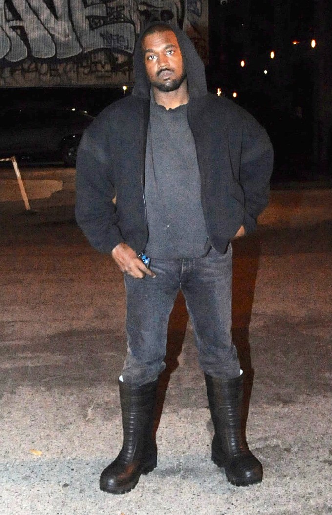 Kanye West Strikes A Defiant Pose As he Steps Out