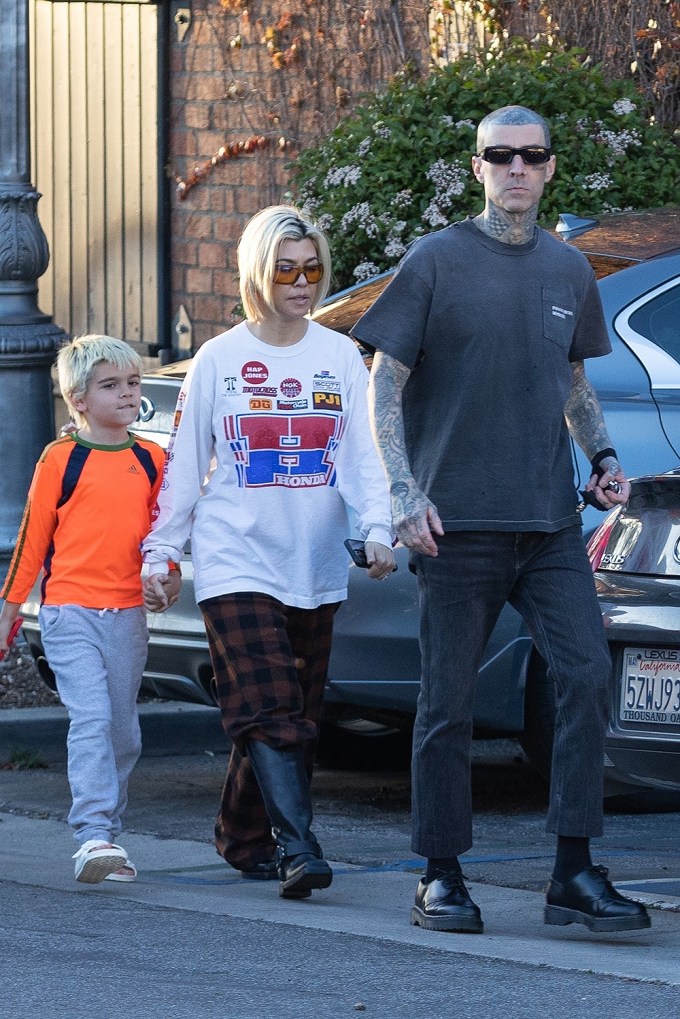 Kourtney Kardashian enjoys an early dinner with her son Reign and husband Travis Barker at his restaurant Crossroads Kitchen