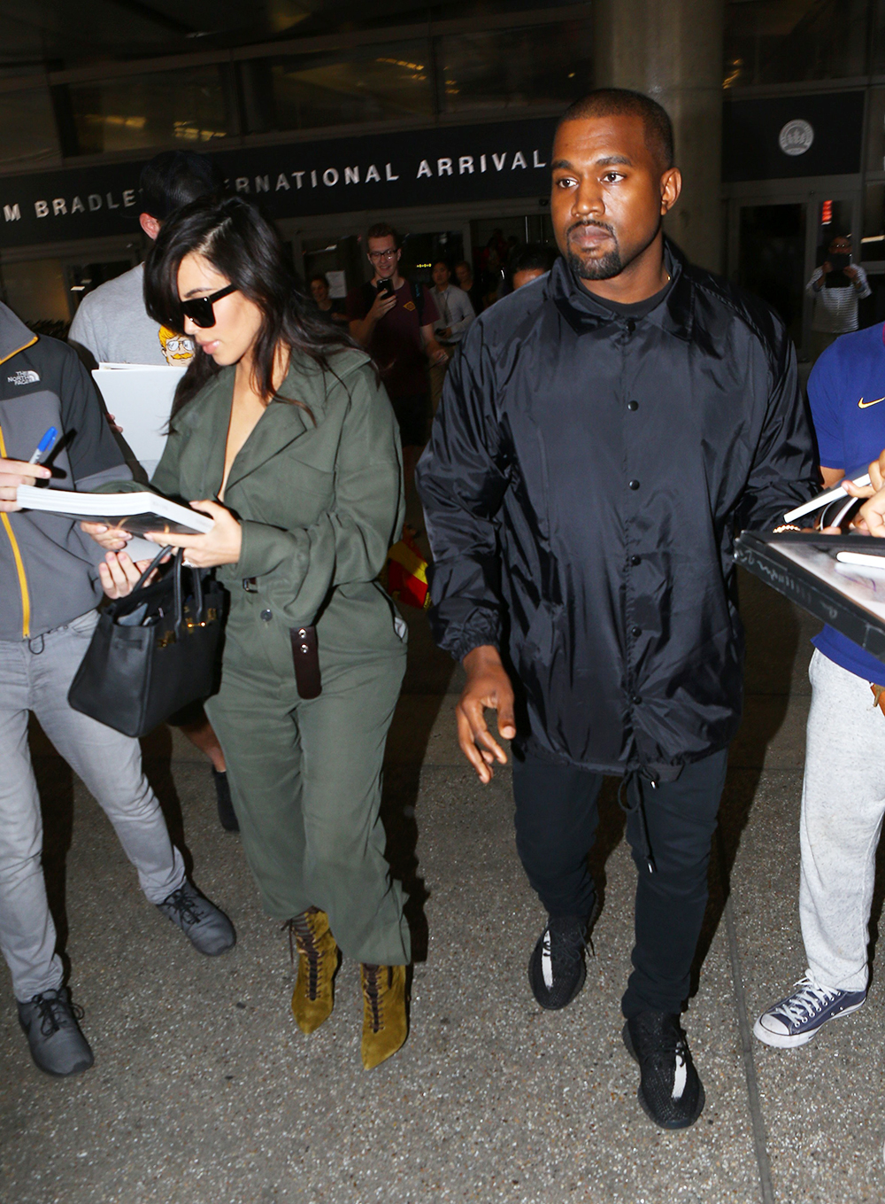 Kim Kardashian and Kanye West touch down in LA on their 2-year anniversary