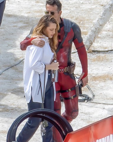 London, UNITED KINGDOM  - *EXCLUSIVE*  - Blake Lively visits the Deadpool 3 set with her sisters Lori and Robyn and their partners as Ryan Reynolds dressed as Deadpool plants a kiss on her head. 
Ryan's daughter was seen with a cute Wolverine toy as she spoke to her dad! Awkward!
They have been filming in London for the new Deadpool film.

Pictured: Ryan Reynolds, Blake Lively, Lori Lively, Robyn Lively

BACKGRID USA 12 JULY 2023 

BYLINE MUST READ: Click News and Media / BACKGRID

USA: +1 310 798 9111 / usasales@backgrid.com

UK: +44 208 344 2007 / uksales@backgrid.com

*UK Clients - Pictures Containing Children
Please Pixelate Face Prior To Publication*