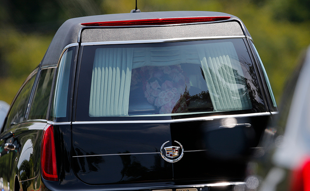 A hearse caring the casket of Bobbi Kristina Brown leaves her funeral service, in Alpharetta, Ga. Bobbi Kristina, the only child of Whitney Houston and R&B singer Bobby Brown, died in hospice care July 26, about six months after she was found face-down and unresponsive in a bathtub in her suburban Atlanta townhome
Bobbi Kristina Brown Funeral, Alpharetta, USA