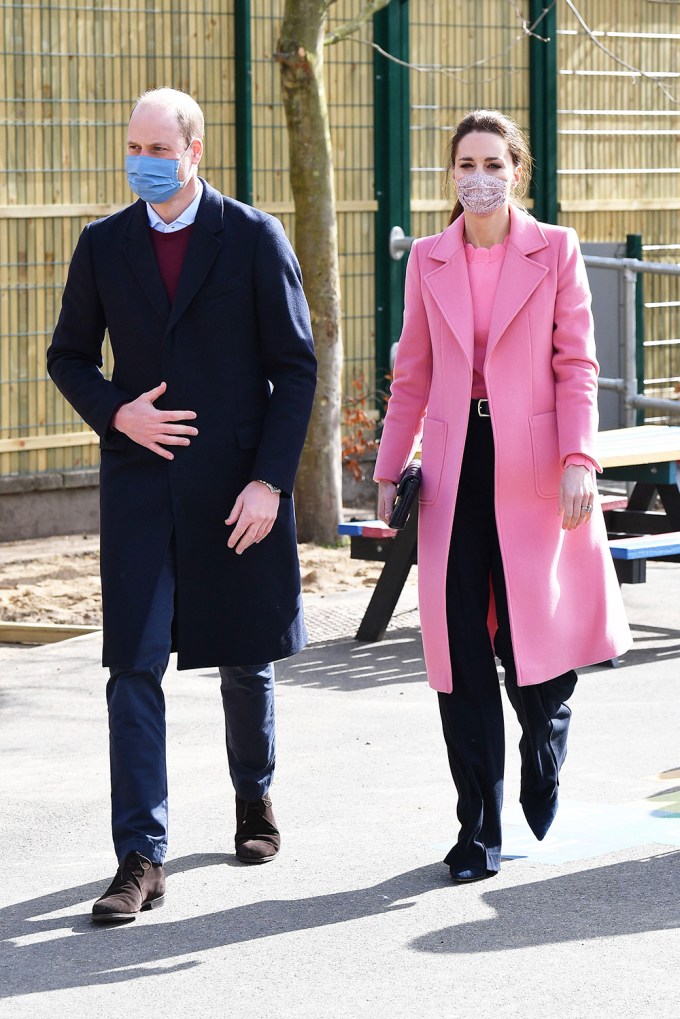 Prince William and Kate Middleton visiting a school