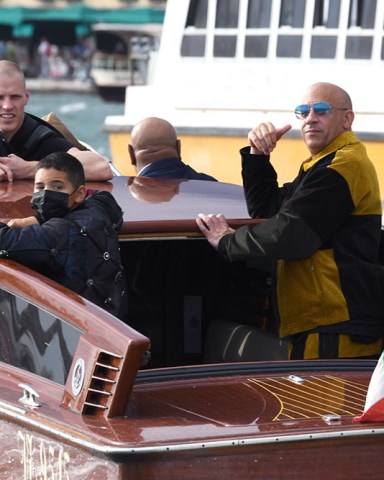 Vin Diesel and his family spotted out in Venice for Dolce and Gabbana show.

Pictured: Vincent Sinclair,Vin Diesel
Ref: SPL5250048 300821 NON-EXCLUSIVE
Picture by: venezia2020/IPA / SplashNews.com

Splash News and Pictures
USA: +1 310-525-5808
London: +44 (0)20 8126 1009
Berlin: +49 175 3764 166
photodesk@splashnews.com

World Rights, No France Rights, No Italy Rights, No Spain Rights