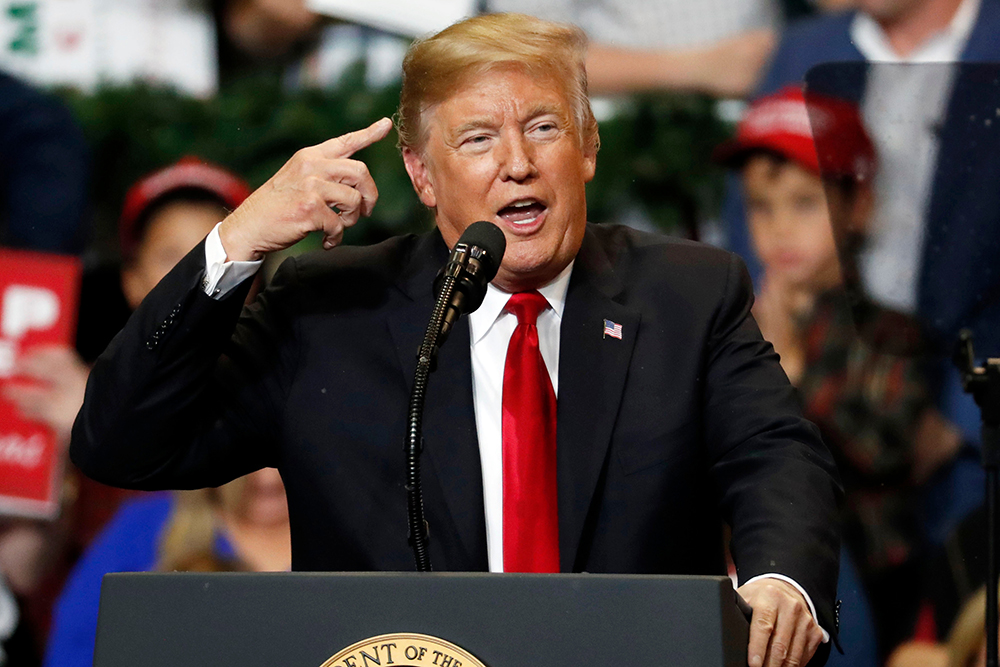 President Donald Trump talks about the fake snow that fell on his hair during a rally in the Mississippi Coast Coliseum, in Biloxi, MissTrump, Biloxi, USA - 26 Nov 2018