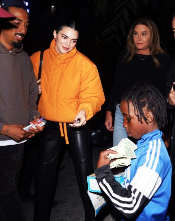 Kendall Jenner and friends buy some candy from a young street vendor as she and father Caitlyn Jenner head to the Clippers Game at Crypto.com Arena in Los Angeles, CA.

Pictured: Kendall Jenner,Caitlyn Jenner
Ref: SPL5496636 231022 NON-EXCLUSIVE
Picture by: Damian Avitia / London Entertainment / SplashNews.com

Splash News and Pictures
USA: +1 310-525-5808
London: +44 (0)20 8126 1009
Berlin: +49 175 3764 166
photodesk@splashnews.com

World Rights