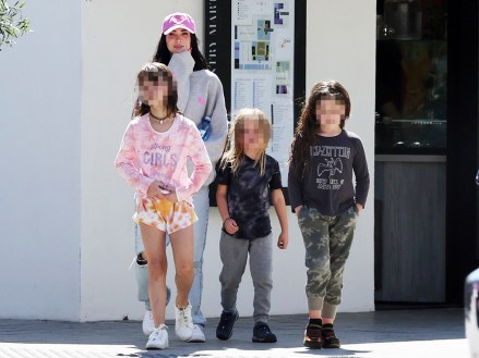 Malibu, CA  - *EXCLUSIVE*  - Actress Meghan Fox can't help but smile while spending time with her three kids after being on tour with fiance Machine Gun Kelly. Meghan was dressed casually and  took her 3 kids for ice cream in Malibu.

Pictured: Meghan Fox

BACKGRID USA 29 MARCH 2022 

USA: +1 310 798 9111 / usasales@backgrid.com

UK: +44 208 344 2007 / uksales@backgrid.com

*UK Clients - Pictures Containing Children
Please Pixelate Face Prior To Publication*