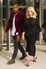 Kanye West and Kim Kardashian West
Louis Vuitton show, Autumn Winter 2015, Paris Fashion Week, France - 11 Mar 2015
WEARING GIVENCHY