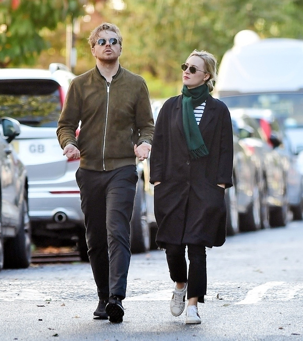 *EXCLUSIVE* London, UNITED KINGDOM  - 27-year old, Irish-American actress Saoirse Ronan winner of the prestigious Golden Globe and Critics' Choice Awards is spotted out with the Scottish Actor and boyfriend Jack Lowden in London. 

The pair were seen out for a stroll as they both donned their dark sunglasses from the hazy sunshine as Saoirse looked well wrapped up from the cold, wearing her long black coat and scarf, from a chilly Autumnal day in the capital.

**SHOT ON 10/03/2021**

Pictured: Saoirse Ronan - Jack Lowden

BACKGRID USA 10 OCTOBER 2021 

BYLINE MUST READ: NASH / BACKGRID

USA: +1 310 798 9111 / usasales@backgrid.com

UK: +44 208 344 2007 / uksales@backgrid.com

*UK Clients - Pictures Containing Children
Please Pixelate Face Prior To Publication*