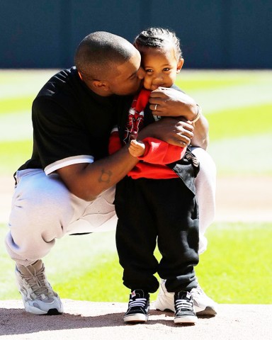 Kanye West, Saint West. Kanye West, kisses his son Saint after throwing out a ceremonial first pitch before a baseball game between the Chicago Cubs and the Chicago White Sox, in Chicago
Cubs White Sox Baseball, Chicago, USA - 23 Sep 2018