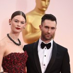 Adam Levine, right, and Behati Prinsloo arrive at the Oscars, at the Dolby Theatre in Los Angeles
87th Academy Awards - Arrivals, Los Angeles, USA - 22 Feb 2015
