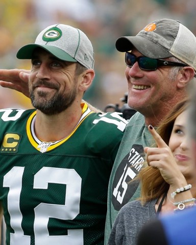 Green Bay Packers' Aaron Rodgers smiles with former quarterback Brett Favre during halftime of an NFL football game against the Minnesota Vikings, in Green Bay, Wis
Vikings Packers Football, Green Bay, USA - 15 Sep 2019