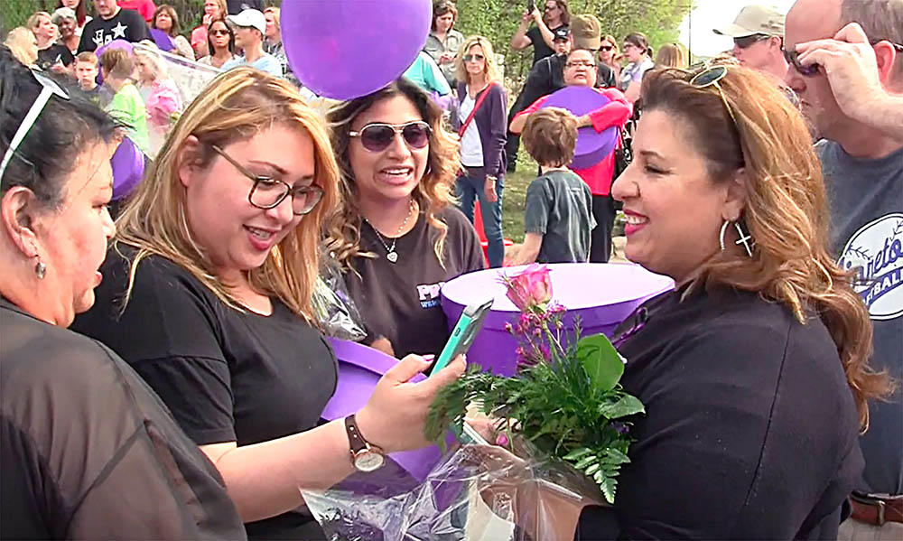 Larry Graham and Prince's friends hug fans outside the Paisley Park Studios