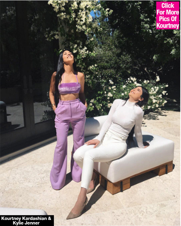 kourtney kardashian purple outfit flaunts abs