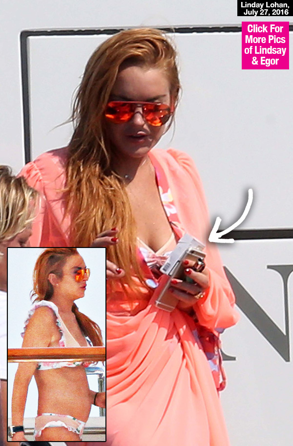 Lindsay Lohan Wears A Bikini & Smokes