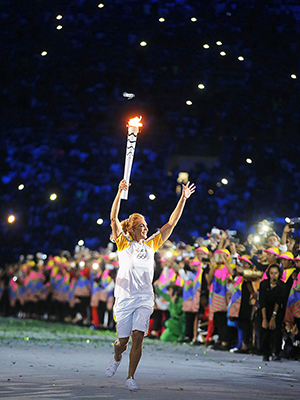 Former Brazilian Basketball Player Hortencia Marcari Carries the Olympic Torch During the Opening Ceremony of the Rio 2016 Olympic Games at the Maracana Stadium in Rio De Janeiro Brazil 05 August 2016 Brazil Rio De JaneiroBrazil Rio 2016 Olympic Games - Aug 2016