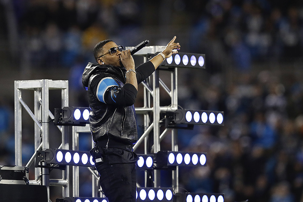 Rapper Nelly performs at halftime during a week 15 NFL football game between the Carolina Panthers and the New Orleans Saints on Monday, Dec. 17, 2018 in Charlotte, N.C. New Orleans won 12-9. (Aaron M. Sprecher via AP)