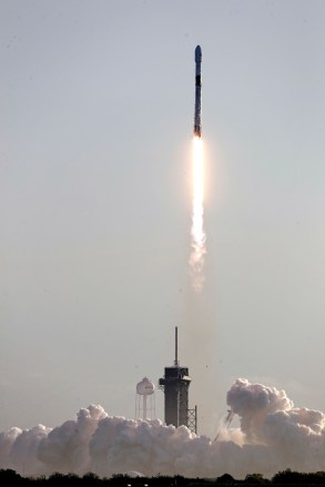 Falcon 9 SpaceX rocket with a payload of approximately 60 satellites for SpaceX's Starlink broadband network lifts off from pad 39A at the Kennedy Space Center in Cape Canaveral, Fla
Rocket Launch, Cape Canaveral, United States - 18 Mar 2020