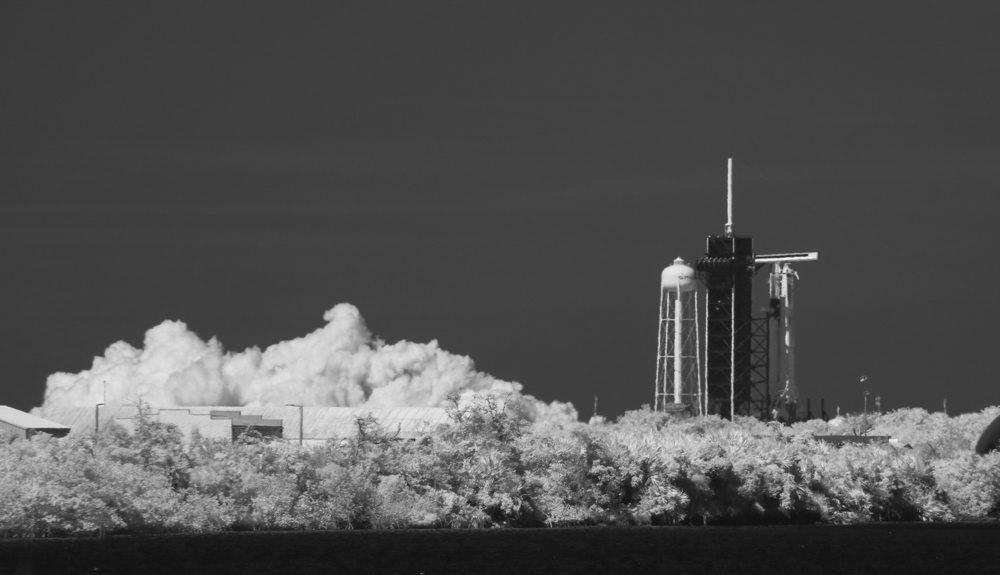 Editorial use only. MANDATORY CREDIT: (NASA/Joel Kowsky) HANDOUT /NO SALES
Mandatory Credit: Photo by NASA/Joel Kowsky HANDOUT/EPA-EFE/Shutterstock (10655879a)
A handout photo made available by NASA shows a black and white infrared image, of a SpaceX Falcon 9 rocket with the company's Crew Dragon spacecraft onboard on the launch pad at Launch Complex 39A during a brief static fire test ahead of NASA's SpaceX Demo-2 mission, at NASA's Kennedy Space Center in Florida, USA, 22 May 2020. NASA's SpaceX Demo-2 mission is the first launch with astronauts of the SpaceX Crew Dragon spacecraft and Falcon 9 rocket to the International Space Station as part of the agency's Commercial Crew Program. The test flight serves as an end-to-end demonstration of SpaceX's crew transportation system. Robert Behnken and Douglas Hurley are scheduled to launch at 4:33 p.m. EDT on 27, May 2020, from Launch Complex 39A at the Kennedy Space Center. A new era of human spaceflight is set to begin as American astronauts once again launch on an American rocket from American soil to low-Earth orbit for the first time since the conclusion of the Space Shuttle Program in 2011.
SpaceX Demo-2 Static Fire, Cape Canaveral, USA - 22 May 2020