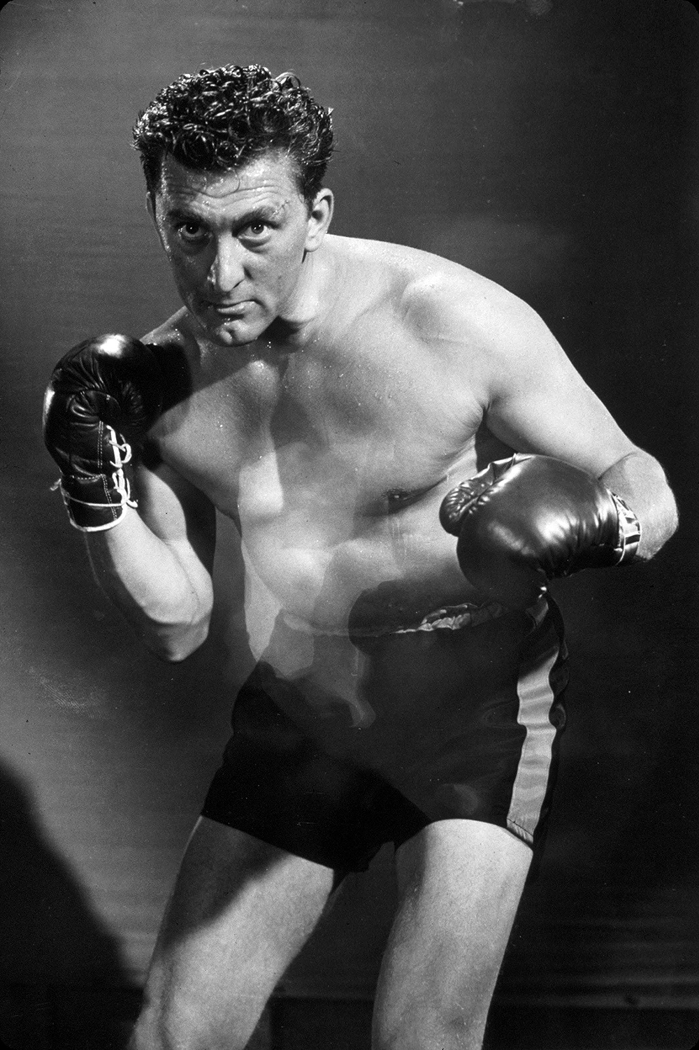 Editorial use only
Mandatory Credit: Photo by Snap/Shutterstock (390864is)
FILM STILLS OF 'CHAMPION' WITH 1949, ACCESSORIES, BARE CHEST, BOXING, BOXING GLOVES, KIRK DOUGLAS, MARK ROBSON, SPORT IN 1949
VARIOUS