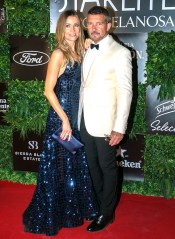 Antonio Banderas (R) and his girlfriend Nicole Kimpel (L) arrive for the Starlite Gala in Marbella, southern Spain, 14 August 2022.
Starlite Gala in Marbella, Spain - 14 Aug 2022